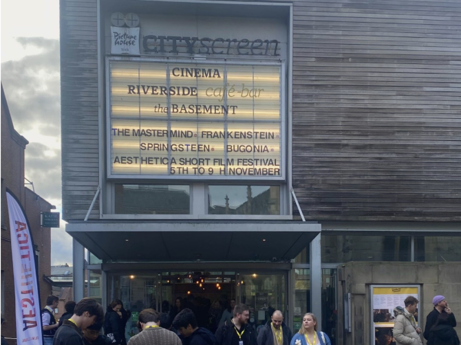 Cityscape board with information about the Aesthetica Film Festival line ups